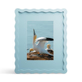 THKRLOF 8x10 blue frame with mat highlights a 5x7 photo.