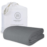 Threadmill luxury cotton blanket in herringbone dark grey for cozy warmth