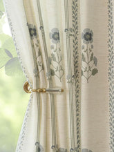 Three Girls pinched-pleat curtains in living room show elegant drape and structure