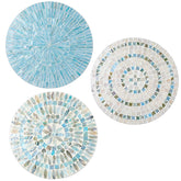 Tioncy 3-pcs blue mother-of-pearl wall plates create a coastal focal point