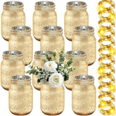 Tioncy painted mason jar with gold lights for a sparkling table centerpiece.