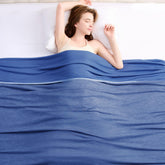 Topcee cooling blanket on king-size bed delivers cool comfort all night.