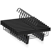 TOPIA HANGER black wooden pants hanger with smooth finish keeps trousers neat.
