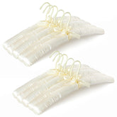 Topia Hanger padded hanger on rack supports shoulder shape and prevents slipping.