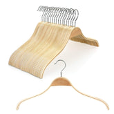 TOPIA HANGER Slim Natural Wood Hangers promote space-saving closet organization.