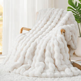 Touchat Luxury faux rabbit fur throw close-up reveals plush texture for cozy warmth.