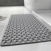 TOWGOU Casa and Beyond shower mat with suction cups for secure grip.