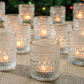 TRIRITE clear votive holders with dot pattern add timeless charm to wedding tables.