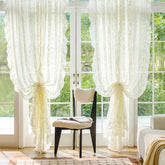 TUDECO ruffle curtains in ivory lace provide soft privacy and a touch of elegance.