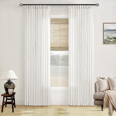 TWODRAPES beige-white linen curtains, pinch-pleat texture, diffusing natural light for a softer room ambience