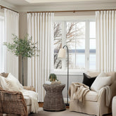 TWODRAPES extra wide 60x90 pleated curtain panel adds privacy while framing large windows.