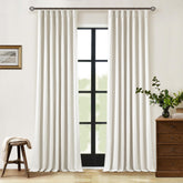 TWODRAPES pinched-pleat linen blackout curtains offer private light control in cream ivory.
