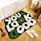 TWWDE AUG You Look Good bath rug front view showcases modern design and plush comfort.