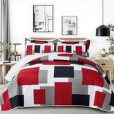 Tyrot patchwork quilt on bed adds vibrant modern style.