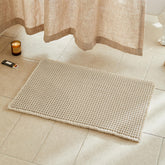 TYUU Pale Beige Waffle Bath Mat with cozy texture for warm feet after showers.