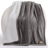 UGG Bliss Throw Blanket front fleece close-up showing plush warmth for bed or couch