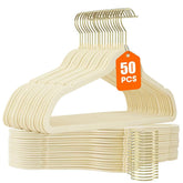 Uinicor beige velvet hanger with non-slip surface keeps garments in place.