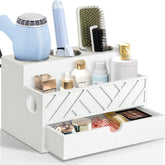 Unistyle hair tool organizer with three-tier cups keeps hair dryers ready.