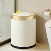 URALFA motion-sensor trash can lid opens hands-free for convenient bathroom use.
