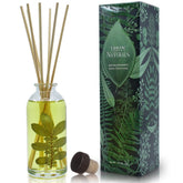 Urban Naturals Eucalyptus Sage diffuser bottle in gift box creates a calming living room ambiance.