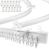 UrbanRed flexible curtain track demonstrates curved installation for custom room shaping.