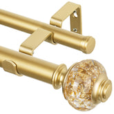 USFOOK telescoping curtain rod in gold for two-layer window treatments.