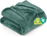 Utopia Bedding fleece blanket in Celadon on a queen bed for cozy elegance.