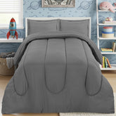 Utopia Bedding grey kids comforter set on a twin bed with a soft microfiber finish