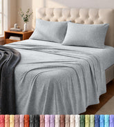 Utopia Bedding queen jersey sheet set on bed offers soft, flexible comfort.