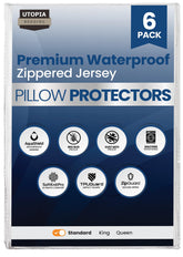 Utopia Bedding set of six pillow protectors on a bed, showcasing standard 20x26 inch fit for clean sleep.