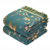 VANJOROY boho throw in teal and beige shown at 50x60 inches for bed or sofa use.