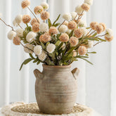 Vanselia ceramic vase with handle on tabletop display for decor.