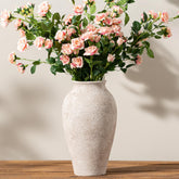 Vanselia ceramic vase tall silhouette holding fresh flowers in living room