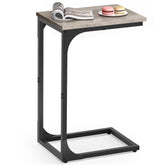 VASAGLE C-shaped end table with slim profile beside a couch for small-space living.
