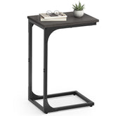 VASAGLE C-Shaped End Table beside sofa for easy reach.