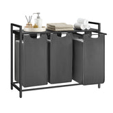 VASAGLE laundry hamper with three compartments for organized sorting.