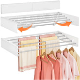 Vasunray wall-mounted drying rack folded against a white wall saves space.