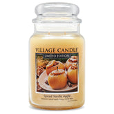 Village Candle Spiced Vanilla Apple jar closeup showing creamy vanilla aroma for cozy evenings.