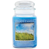 Village Candle Summer Breeze large glass jar in ocean blue for a cozy living room ambiance.