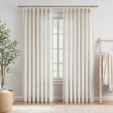 Vision Home pinched-pleat curtains for a tailored, modern look.