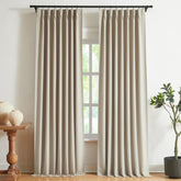 Vision Home sand pinch-pleated blackout curtains block light and enhance privacy.
