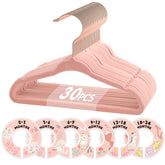 VIS'V baby hangers in velvet finish help keep baby clothes securely in place.