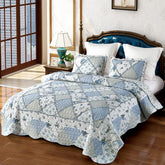 VIVILINEN oversized king blue floral patchwork quilt texture highlights soft, lightweight warmth.