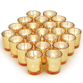 Volens gold mercury glass votive 72pc set creates warm, elegant centerpiece lighting.