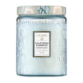 Voluspa California Summers candle jar with embossed glass and lid for elegant room ambience.