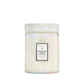 Voluspa Sparkling Cuvee candle jar showcases elegant design for stylish home ambiance.