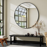 VooBang 48-inch round mirror with bold black frame, ideal as a statement focal point