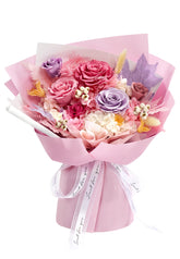 Vryblos preserved pink roses bouquet with vase offers lasting beauty.