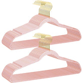 VSV Storage pink hangers with 16-inch slim profile maximize closet space.