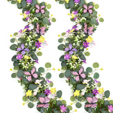 Waipfaru eucalyptus garland with daisies and 3D butterflies enhances table decor